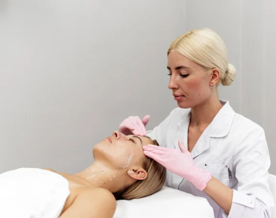 A professional therapist applying a Crystal Clear Oxygen Facial to a client, providing the red carpet glow favoured by celebrities for instant skin rejuvenation.