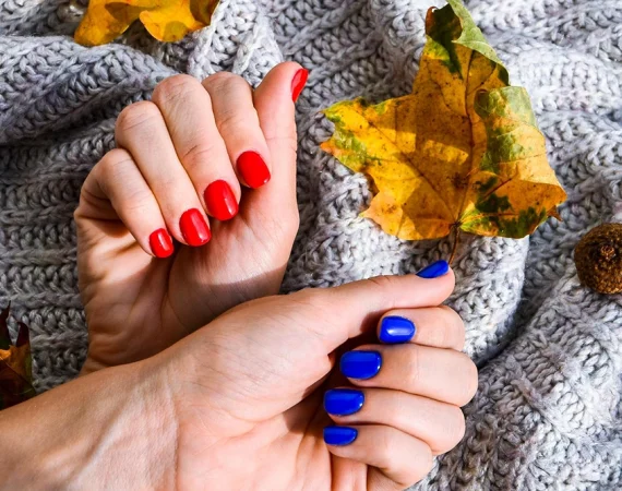 A professional manicure session at Beauty by Ruth focusing on maintaining healthy nails using nourishing oils and restorative base coats.
