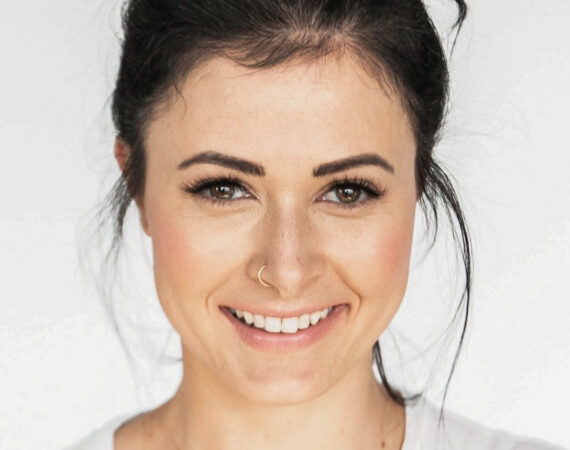 A professional skincare consultation at Beauty by Ruth, discussing various Prescriptive Facial Options to treat acne, fine lines, and skin sensitivity.